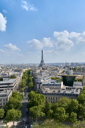 The famous Avenue Foch and the Eifel tower on a sunny day