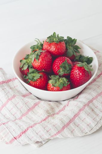 A vertical shot of a delicious strawberry bowl