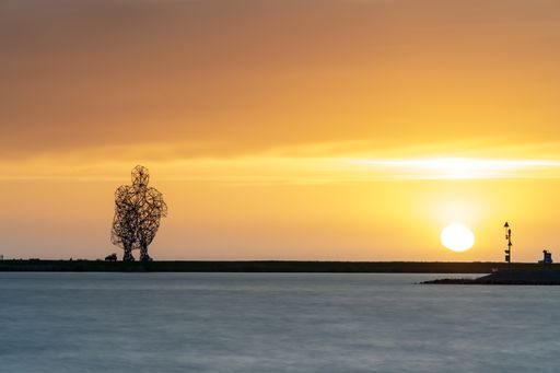 A beautiful shot of a lake during the sunset