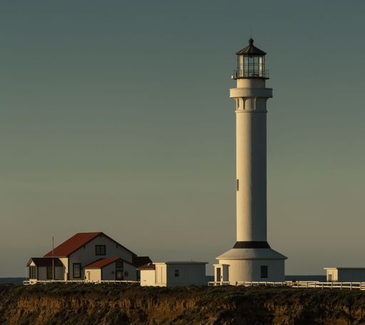A closeup of the Point Arena Lighthouse during sunset at Mendocino County in California