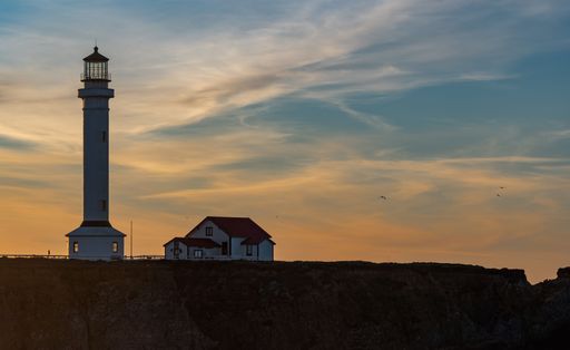 A closeup of the Point Arena Lighthouse at dusk at Mendocino County in California