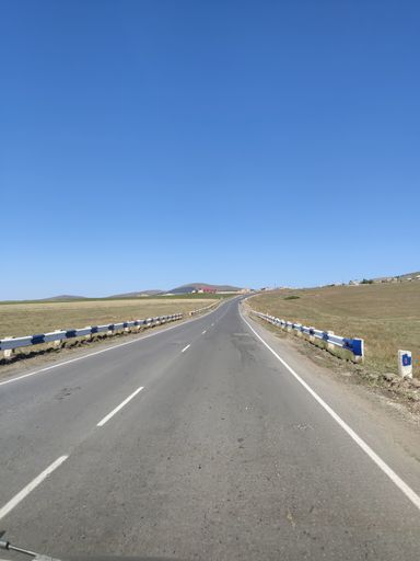A vertical shot of the asphalt road to Aparan near Aragats mount captured in Armenia