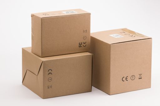 The cardboard boxes on the white background