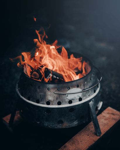 A vertical shot of an outdoor fireplace near Switzerland in the evening