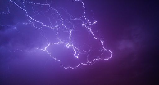 A mesmerizing view of the thunder on a night sky