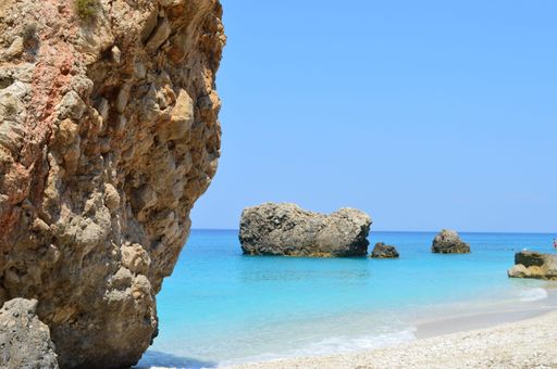An image of big rocks in the Megali Petra beach in Lefkada, Greece