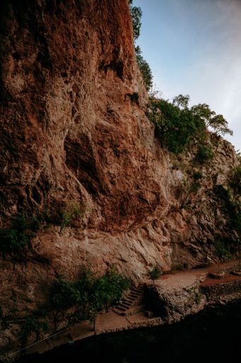 A vertical shot of high rocky mountains in Blagaj Tekija, Bosnia and Herzegovina