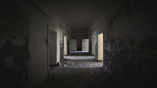 A corridor in a an old abandoned building
