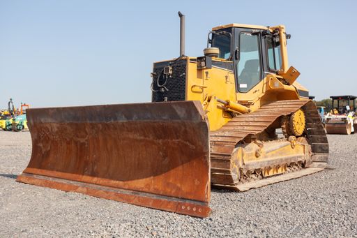 A closeup shot of a single bulldozer in a construction site