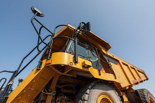 A low angle shot of an offroad dump truck