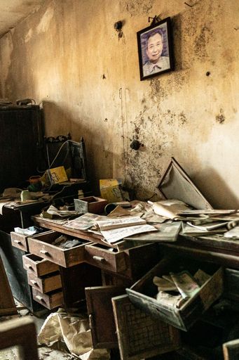 A vertical shot of a studio in an old, dilapidated house in the rural area surrounding Ningbo City, China