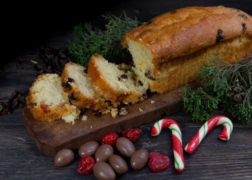 fruit pudding with christmas decorations on the rustic table
